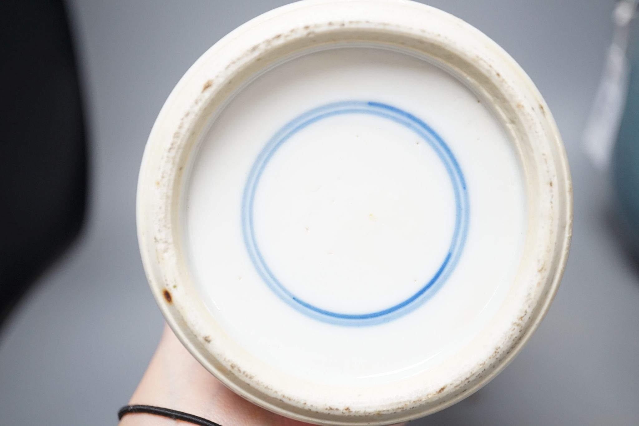 A Chinese blue and white Prunus vase, a Chinese enamelled porcelain bowl and a pale blue crackle glaze vase, tallest 32 cm